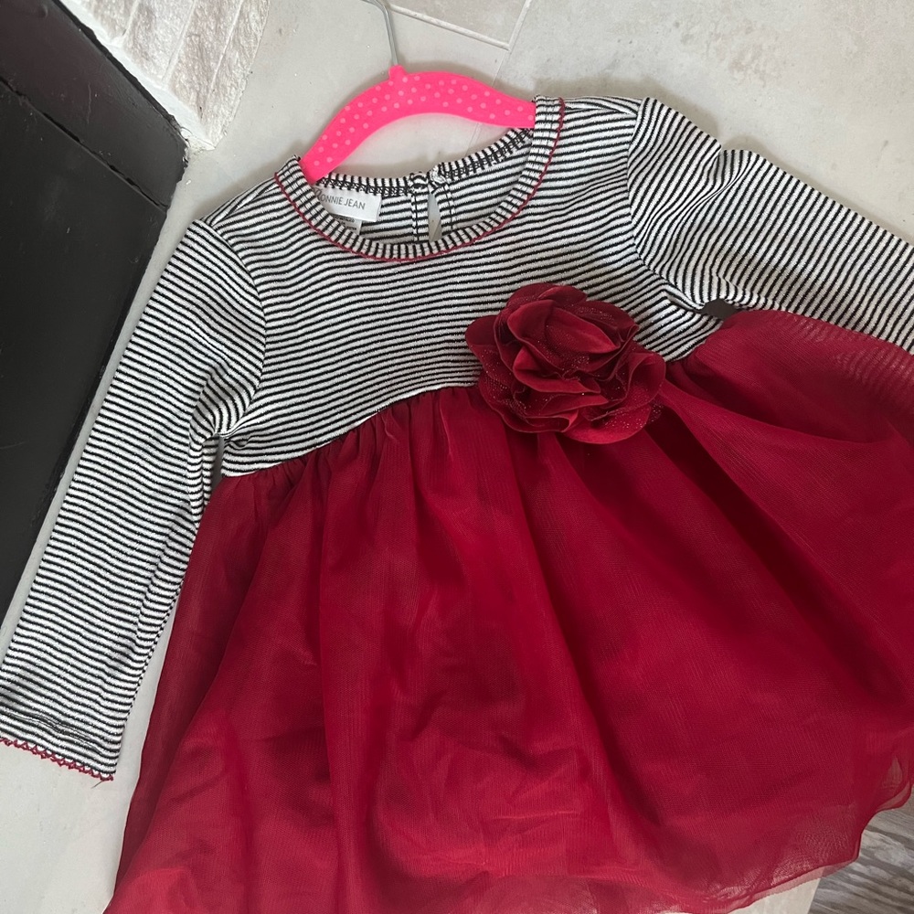 Polyester dress with a maroon skirted bottom. blk, white & metallic stripe top.